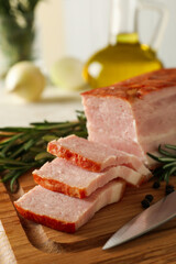 Concept of tasty snack with bacon on cutting board