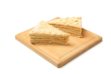 Board with pieces of Napoleon cake isolated on white background