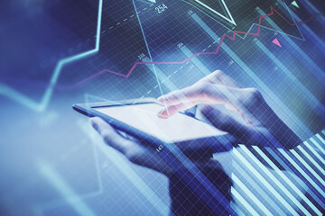 Double exposure of forex chart sketch hologram and woman holding and using a mobile device. Financial market concept.