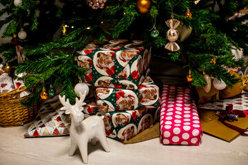 various gifts under beautiful christmas tree