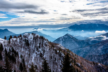 snow-capped alpine peaks in the clouds