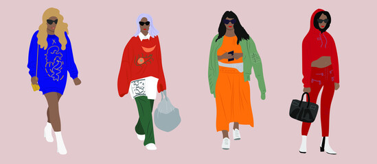 A young African-American girl in trendy modern clothing demonstrates the fashion.