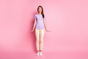 Full size photo of amazing lady stand straight dressed purple t-shirt isolated on pink color background