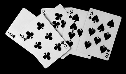 Poker playing cards isolated on black background with clipping path