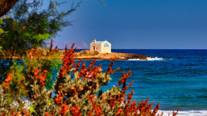 The island with the chapel of the same name "Afentis Christos" in front of the island of Crete