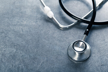 Black stethoscope for doctor diagnostic coronavirus disease, medical tool for health on blue...