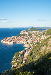 Fototapeta na wymiar It is a landscape overlooking the walls of Dubrovnik, Croatia. The sky is blue and the blue of the Adriatic Sea is also shining.