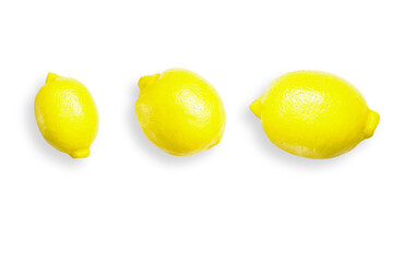 Three lemons isolated on a white background . Lemons is a natural source of vitamin c .