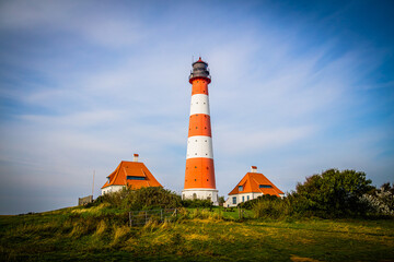 Fototapeta na wymiar Lighthouse of Westerhever at the Northsea coast of Schleswig-Holstein, Germany