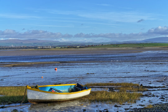 A small rowing boat on the shore at Sunderland Point