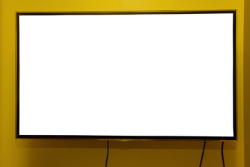 Television on yellow wall, 4K flat screen TV, blank HD monitor mockup