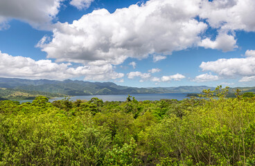 Obraz premium Amazing view of beautiful nature of Costa Rica with lake and forest near volcano Arenal in summer. La Fortuna, Costa Rica. Central America.