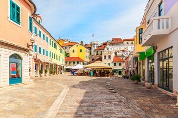 Fototapeta na wymiar Center square near the clock-tower and old town gate of Herceg Novi, Montenegro