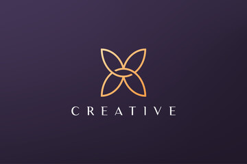 gold leaf luxury flower logo in simple shape with modern style