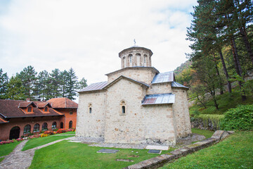 Fototapeta na wymiar Serbian Orthodox monastery. Beautiful view on nature landscape in background. The Ovcar-Kablar Gorge, western Serbia