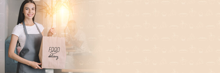 Young waitress with food for delivery from restaurant on color background with space for text