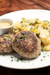 german frikadellen meatballs with creamy onion fried potatoes