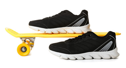 Stylish male shoes and skateboard on white background © Pixel-Shot