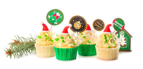 Tasty Christmas cupcakes on white background