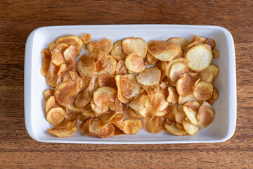 Homemade potato chips in bowl