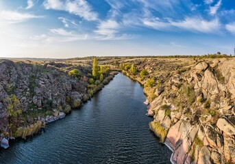 Fototapeta premium A stream flowing among huge stones in picturesque Ukraine