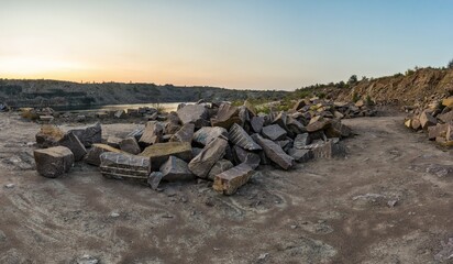 There are large piles of boulders on the territory of the mine.