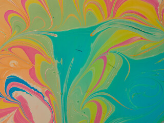Fototapeta na wymiar Coloring with liquid acrylic paints. Fluid acrylic art. Mixed liquid paints. Beautiful abstract background. Mixing acrylic paints in water. Photo of the liquid surface in the top view. Colorful textur