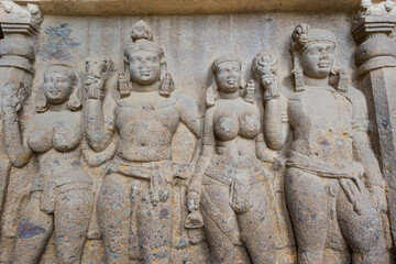 Fototapeta na wymiar Buddha sculptures on wall at entrance to the largest Kanheri cave at Sanjay Gandhi National Park, Mumbai, India