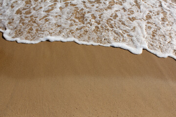 brown Sand beach and foam