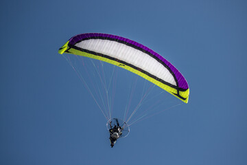 motor glider in blue sky