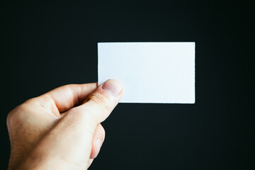 Fototapeta premium white small paper in hand
