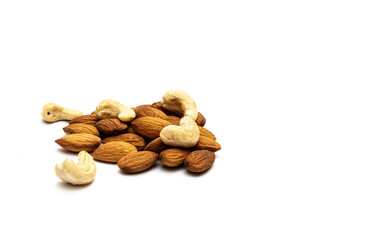 Almonds and cashew nuts on a white background