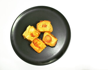 crispy bread stuffed slice smoked pork sausage on plate