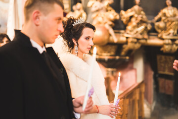 Wedding couple bide and groom get married in a church