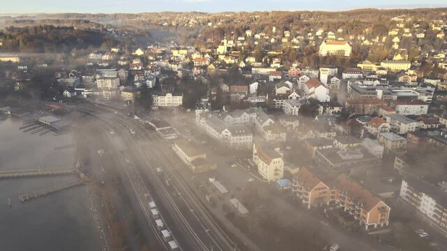 Time lapse of fog moving over Starnberg on Lake Starnberg. Aerial shot of drone on a winter morning