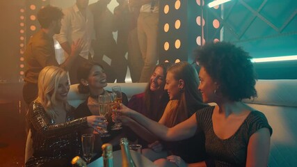 Beautiful ladies toasting with champagne 