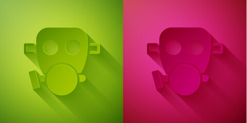 Paper cut Gas mask icon isolated on green and pink background. Respirator sign. Paper art style. Vector.