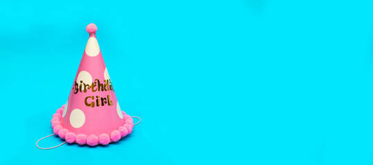 Party birthday girl hat isolated on blue background