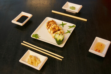 Beautiful and delicious varied sushi rolls on a stone board oporto portugal