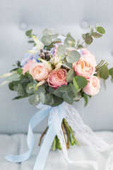Close up of wedding bouquet with hydrangea and roses