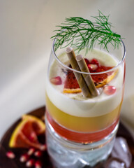 Cocktail in the restaurant served with grapefruit decoration
