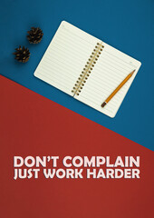 Motivational poster, don't complicate, just work harder, desktop and workplace with notepad and pen, simple and flat creative background, copy space, top view