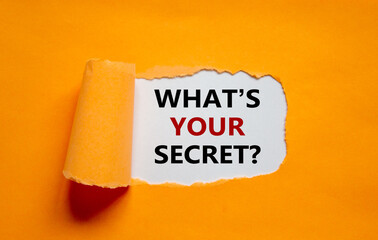 What is your secret symbol. The text 'What is your secret' appearing behind torn orange paper. Business and what is your secret concept. Copy space.