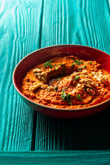 Roasted red bell pepper spread in a red bowl