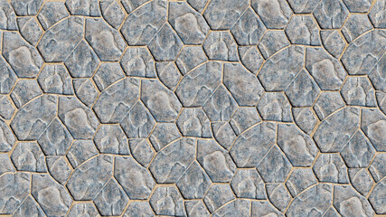 The texture of paving stones from gray artificial stone.