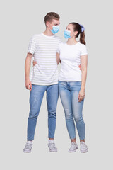 Couple Wearing Medical Mask Watching at Each Other Isolated. Man and Woman Hugging, Lovers, Friends, Couple, Virus Concept