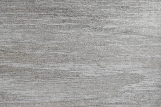 Close up shot of grey wood texture for background use
