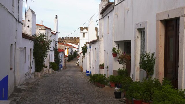 Traditional houses and castle  on the Alentejo village of Terena, in Portugal