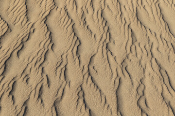 Irregular Patterns in sand created by the wind, Mesquite Dunes, Death Valley, California. 
