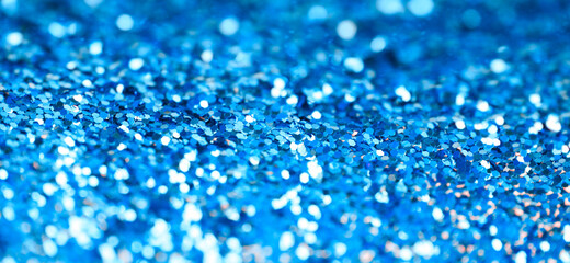 Blueglitter shine dots confetti. Abstract light blink sparkle defocus backgound.